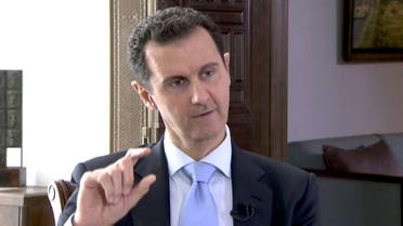 Syrian President Bashar al-Assad speaks during a TV interview in Damascus, Syria in this still image taken from a video on November 29, 2015.  (Reuters)