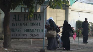Pakistani students arrive at the Al-Huda Institute, a high-profile female Islamic religious school in Multan, Pakistan. (AFP)