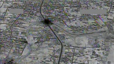 This image made from gun-camera video taken on July 4, 2015 and released by United States Central Command shows an airstrike on a main road and transit route near the Islamic State group-held Raqqa, Syria. After billions of dollars spent and more than 10,000 extremist fighters killed, the Islamic State group is fundamentally no weaker than it was when the U.S.-led bombing campaign began a year ago, American intelligence agencies have concluded