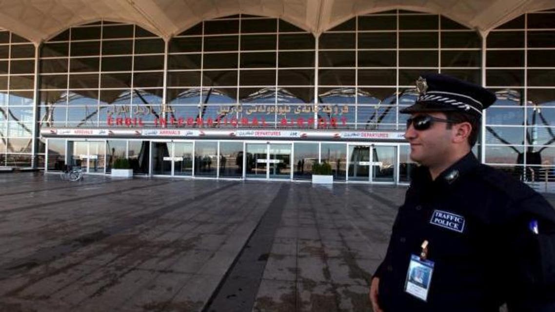 A Kurdish policeman stands guard at Arbil International Airport November 23, 2015. (Reuters)