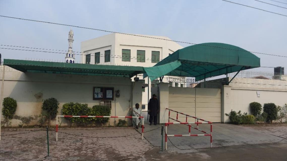Pakistani private security personnel guard the entrance to the Al-Huda Institute, a high-profile female Islamic religious school in Multan on December 7, 2015. (AFP)