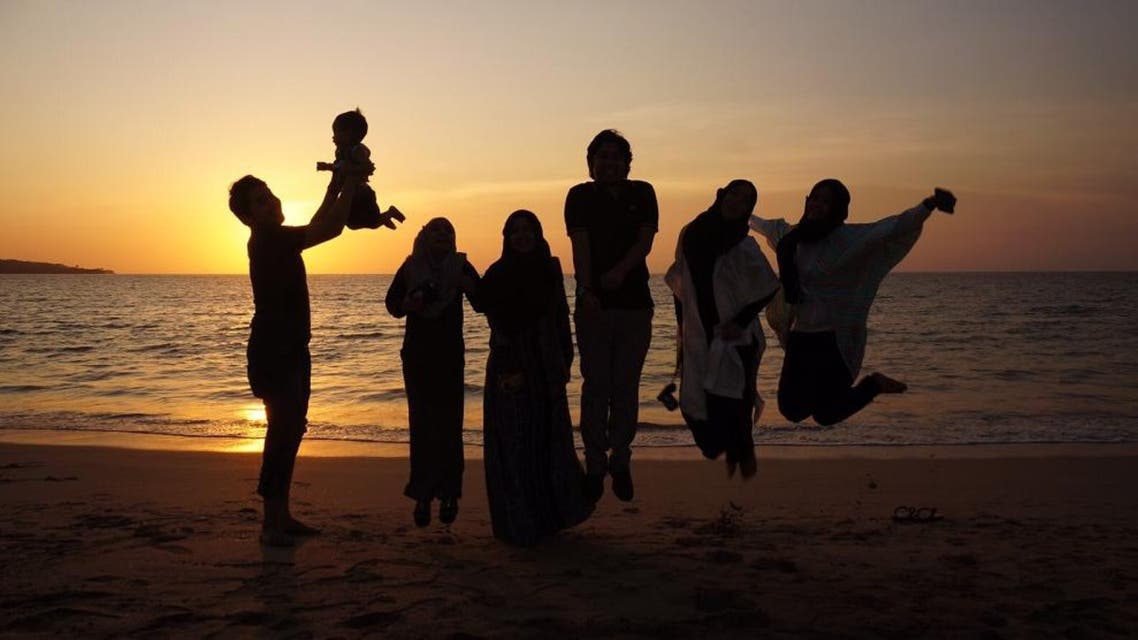 A family on their last night in Indonesia. Taken against the backdrop of Jimbaran beach, Bali.(Photo courtesy of Indonesian Minsitry of Tourism)