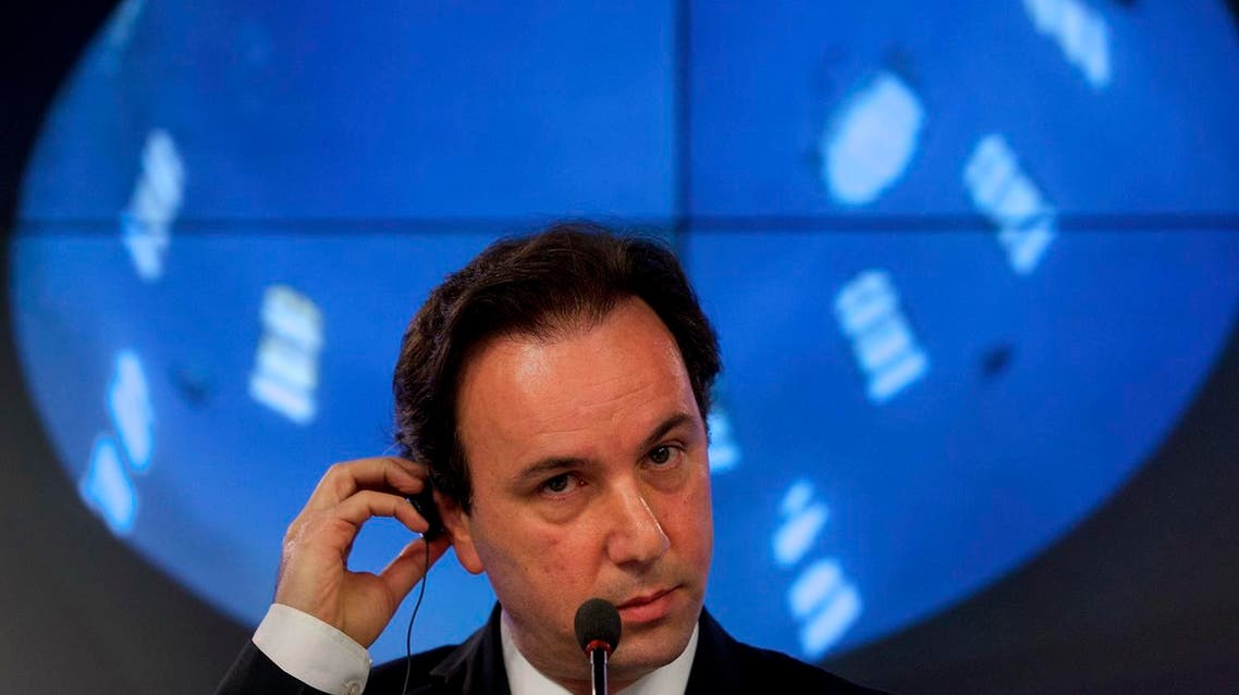 Syrian National Coalition President Khaled Khoja adjusts a translation earphone during a news conference. (File photo: AP)