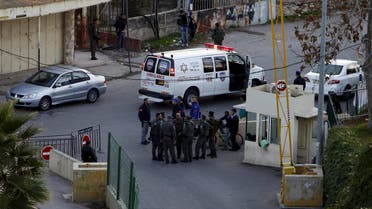 sraeli border policemen stand guard near the scene where a Palestinian man stabbed and critically wounded an Israeli before being shot dead by Israeli forces, in the West Bank city of Hebron December 7, 2015. reuters