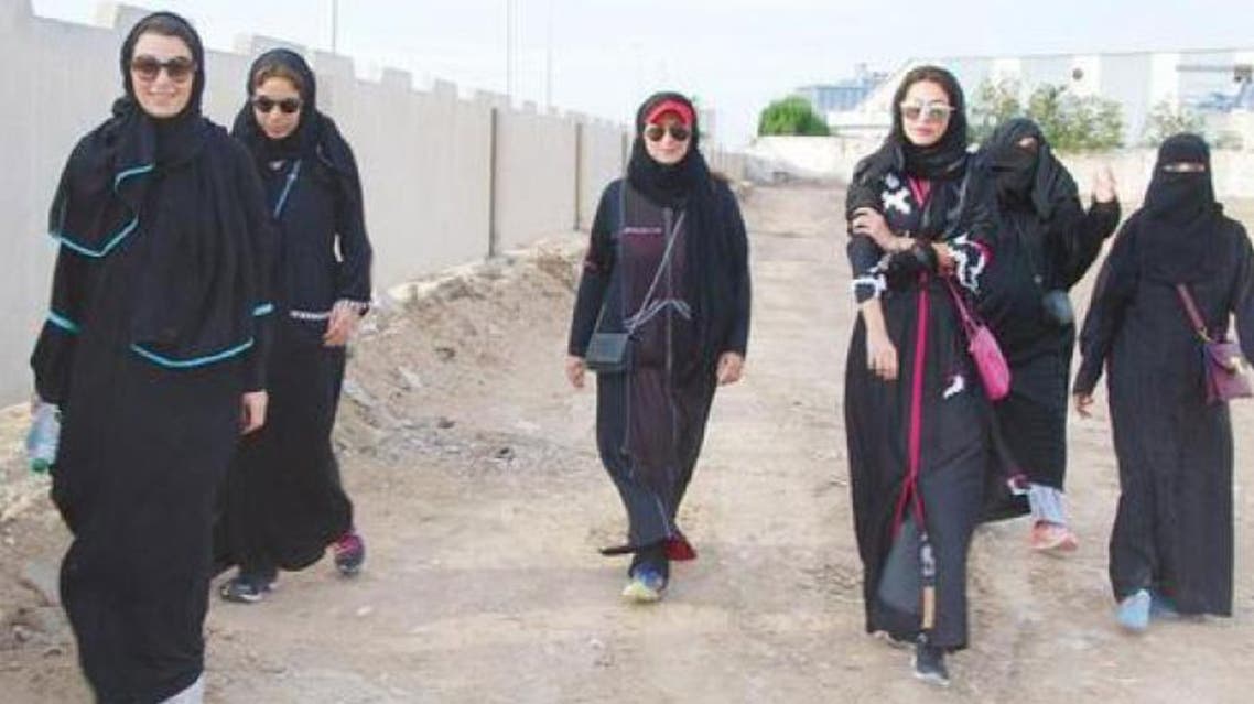 Women supporting Lama Al-Sulaiman's election campaign in Jeddah walk through the city's upscale Al-Basateen District. (Photo: Okaz)