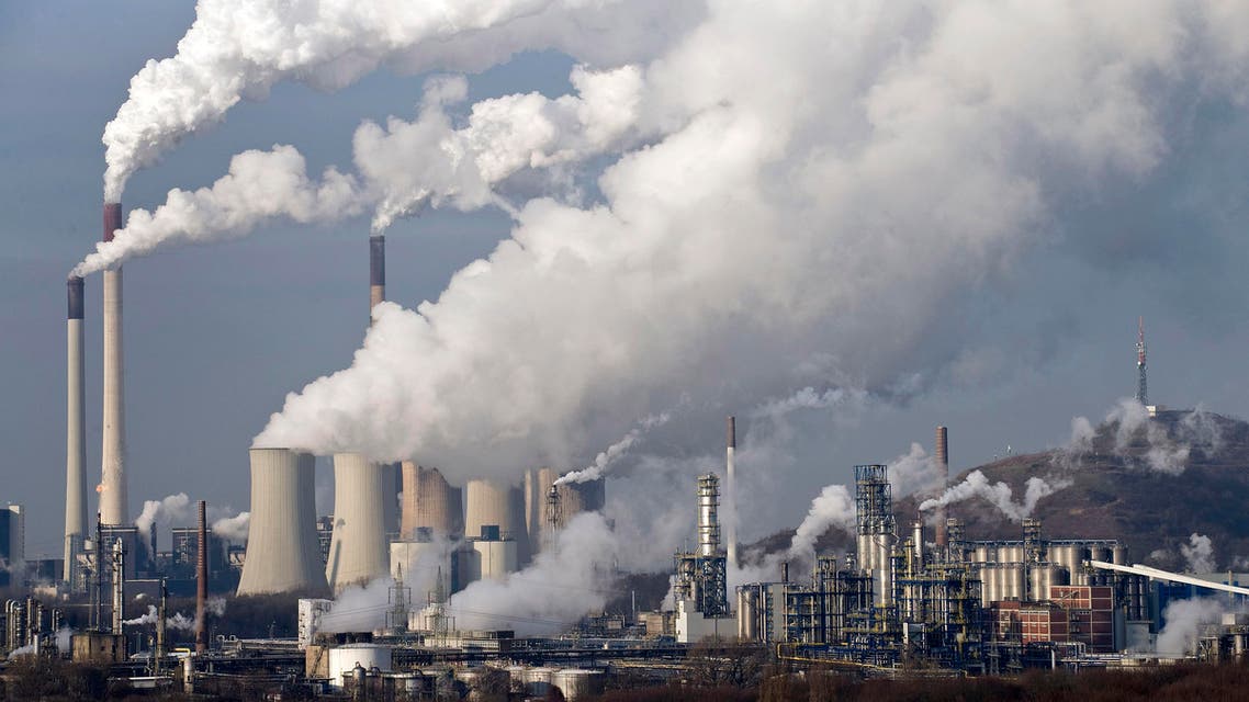In this Dec. 16, 2009 file photo, steam and smoke rises from a coal power station in Gelsenkirchen, Germany. AP