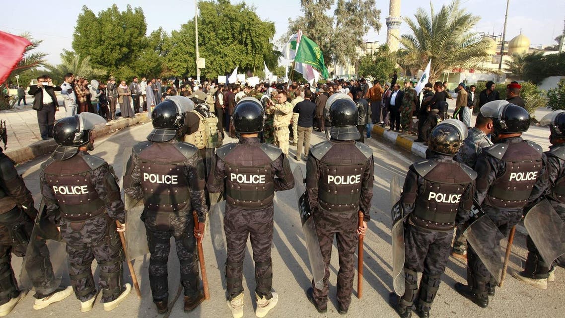 Riot police stand in front of protesters during a demonstration against Turkish military deployment in Iraq. (File photo: Reuters)