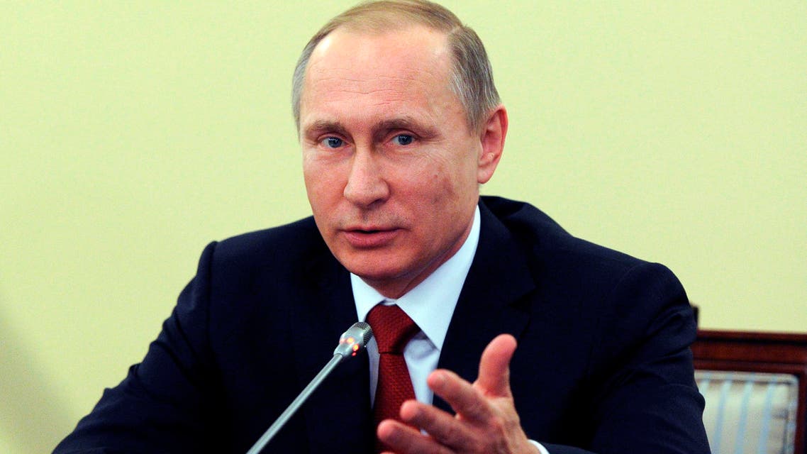 Russian President Vladimir Putin gestures while speaking to the judges of the Russian Constitutional Court in St.Petersburg, Russia, Monday, Dec. 14, 2015. (AP)