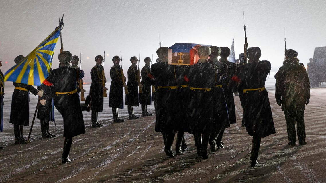 Russian honor guard carry the coffin with the body of Russian Lt. Col. Oleg Peshkov, after being transported from Turkey, at a mourning ceremony in Chkalovsky military airport outside Moscow, Monday, Nov. 30, 2015. (AP)