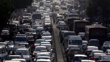 People in vehicles are seen caught in traffic in downtown Cairo May 29, 2013. (Reuters)
