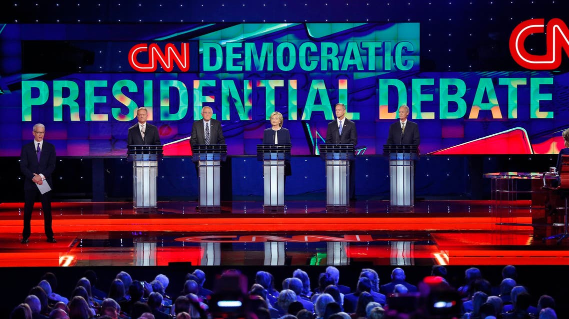 Democratic presidential candidates from left, former Virginia Sen. Jim Webb, Sen. Bernie Sanders, of Vermont, Hillary Rodham Clinton, former Maryland Gov. Martin O'Malley, and former Rhode Island Gov. Lincoln Chafee take the stage before the CNN Democratic presidential debate Tuesday, Oct. 13, 2015, in Las Vegas.