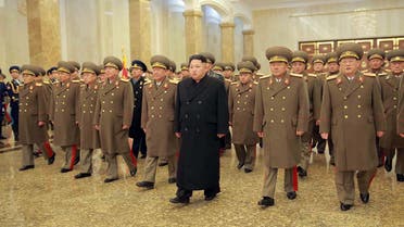 North Korean leader Kim Jong-Un (C), accompanied by commanding officers of the Korean People's Army, visit the Kumsusan Palace where his father Kim Jong-Il lies in state in Pyongyang on December 17, 2015. (AFP)