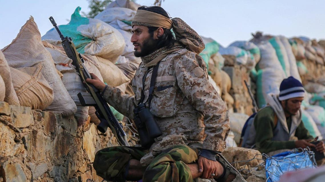 Yemeni tribesmen from the Popular Resistance Committees, supporting forces loyal to Yemen's Saudi-backed President Abedrabbo Mansour Hadi, hold a position in the country's third city Taez. (AFP)
