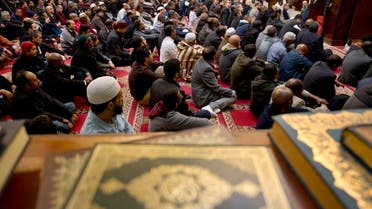 Men listen during a prayer service as Rep. Don Beyer, D-Va., and other local elected officials also attend Friday prayers at Dar al-Hijrah Mosque in Falls Church, Va., Friday, Dec. 4, 2015. ap