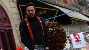 Singer of the US rock group Eagles of Death Metal, Jesse Hughes, pays tribute to the victims of the November 13 attacks in Paris. (File photo: AFP)