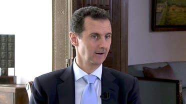 Syrian President Bashar al-Assad speaks during a TV interview in Damascus, Syria in this still image taken from a video on November 29, 2015 | Reuters
