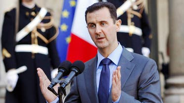 In this Thursday Dec. 9, 2010 file photo, Syria President Bashar al-Assad addresses reporters following his meeting with French President Nicolas Sarkozy at the Elysee Palace in Paris, France. 