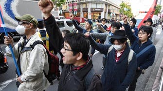 Angry single men stage anti-Christmas rally in Tokyo