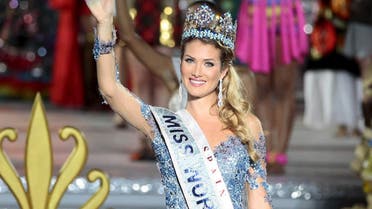 Miss Spain Mireia Lalaguna Royo waves after crowning the Miss World 2015 beautiful pageant in Sanya. (Reuters)