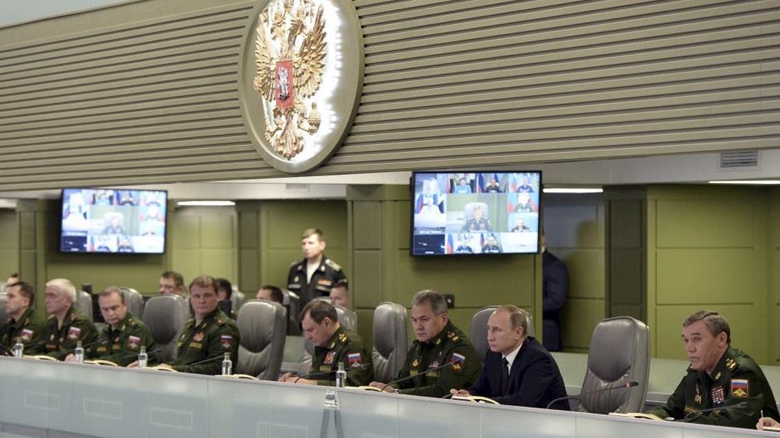 Russian President Vladimir Putin with Defence Minister Sergei Shoigu and armed forces Chief of Staff Valery Gerasimov attend a meeting on Russian air force's activity in Syria at the national defence control centre in Moscow, Russia, November 17, 2015 | Reuters