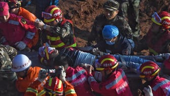Moment man found alive after 60 hours in China landslide