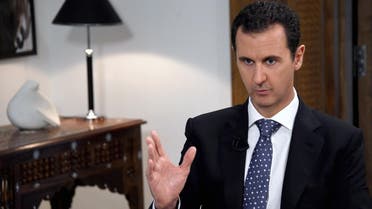 In this photo released by the Syrian official news agency SANA, shows Syrian President Bashar Assad, speaks during an interview with the Spanish news agency EFE, in Damascus, Syria, Friday, Dec. 11, 2015. (SANA via AP)