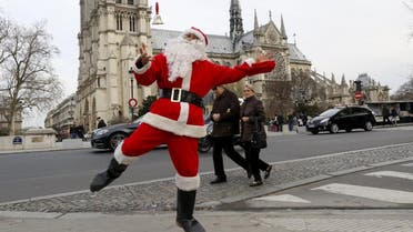 A man is dressed up as Santa Clause in Paris. (File photo: Reuters) 
