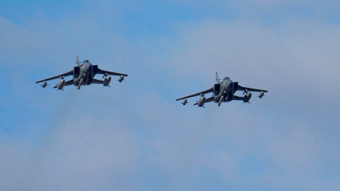 Two British Tornados warplanes fly over the RAF Akrotiri, a British air base near costal city of Limassol, Cyprus, Thursday, Dec. 3, 2015, as they arrive from an airstrike against Islamic State group targets in Syria.