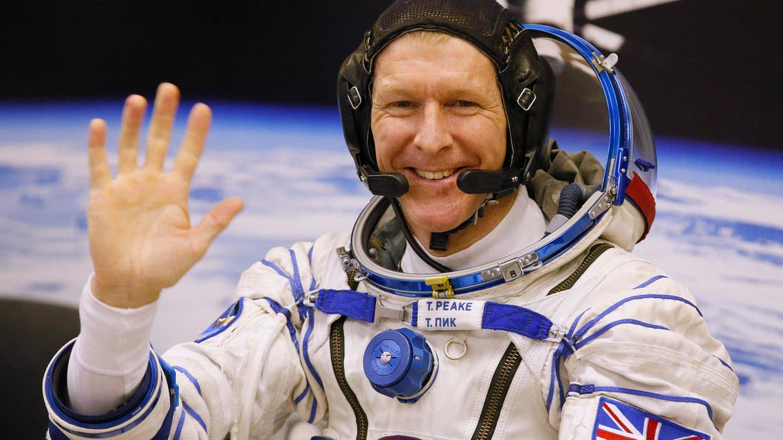 British astronaut Tim Peake, member of the main crew of the expedition to the International Space Station (ISS), gestures prior the launch of Soyuz TMA-19M space ship at the Russian leased Baikonur cosmodrome, Kazakhstan, Tuesday, Dec. 15, 2015.
