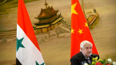  Syrian Foreign Minister Walid al-Moallem speaks during a press briefing with his Chinese counterpart Wang Yi at China's Ministry of Foreign Affairs in Beijing, Thursday, Dec. 24, 2015. (AP Photo/Mark Schiefelbein)