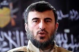 Top Syrian rebel leader killed in air strike in Damascus suburb - rebel sources ============================================= BEIRUT, Dec 25 (Reuters) - Zahran Aloush, the head of Jaysh al Islam, one of the most powerful insurgent groups in the rebel-held suburbs of Damascus, was killed in an aerial raid that targeted his group's headquarters, two rebel sources said on Friday. They said a secret headquarters of the rebel group, which is the largest rebel faction in the area and has thousands of fighters, was targeted by what they described as Russian planes.