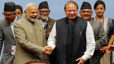 Pakistani Prime Minister Nawaz Sharif, right, and Indian Prime Minister Narendra Modi shake hands during the 18th summit of the South Asian Association for Regional Cooperation (SAARC) in Katmandu, Nepal, Thursday, Nov. 27, 2014. 