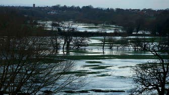 Floods hit parts of England as government scrambles to respond