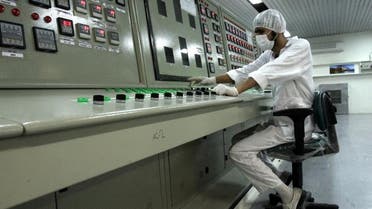 An Iranian technician works at the Uranium Conversion Facility just outside the city of Isfahan in 2007. (File photo: AP)