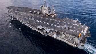 Iranian navy test fires rockets near U.S. carrier