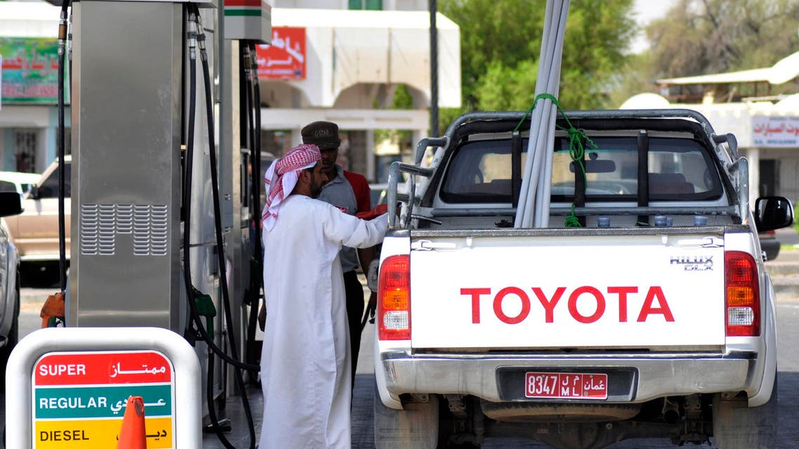A motorist pumps petrol at a petrol station in Al Buraimi, near Oman's border with the United Arab Emirates September 14, 2010 (Reuters)