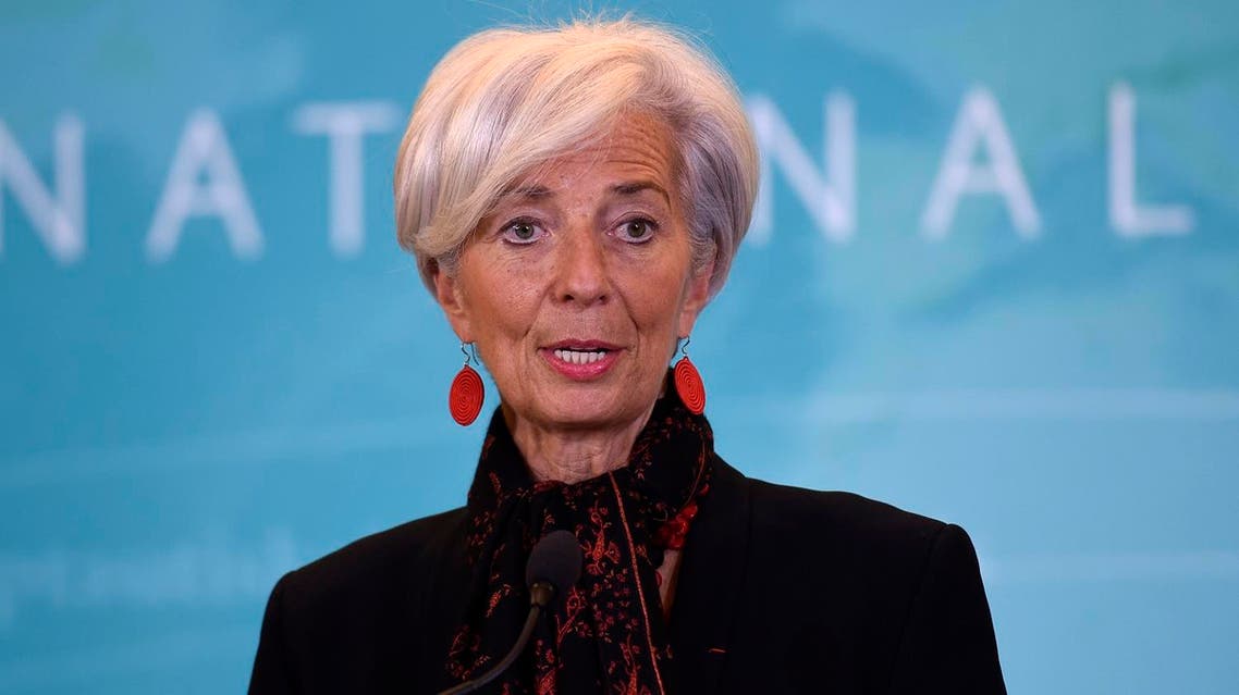 IMF Managing Director Christine Lagarde warned that rising U.S. interest rates and a stronger dollar could lead to firms defaulting on their payments. (AP)