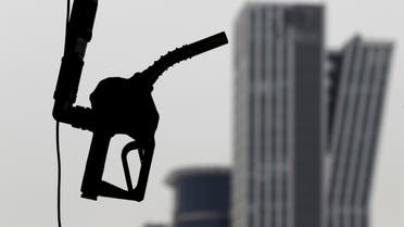 A gasoline pump is seen hanging at a petrol station in central Seoul in this April 6, 2011 file photo. REUTERS/