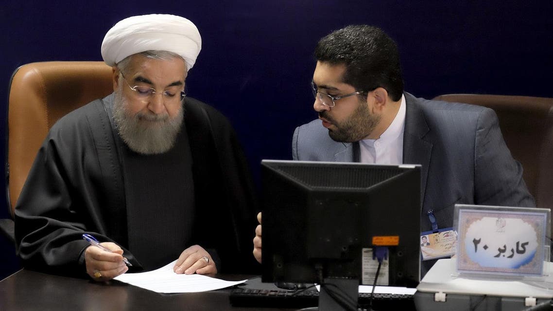 Iranian President Hassan Rouhani registers for February's election of the Assembly of Experts, the clerical body that chooses the supreme leader, at the Interior Ministry in Tehran. (Reuters)