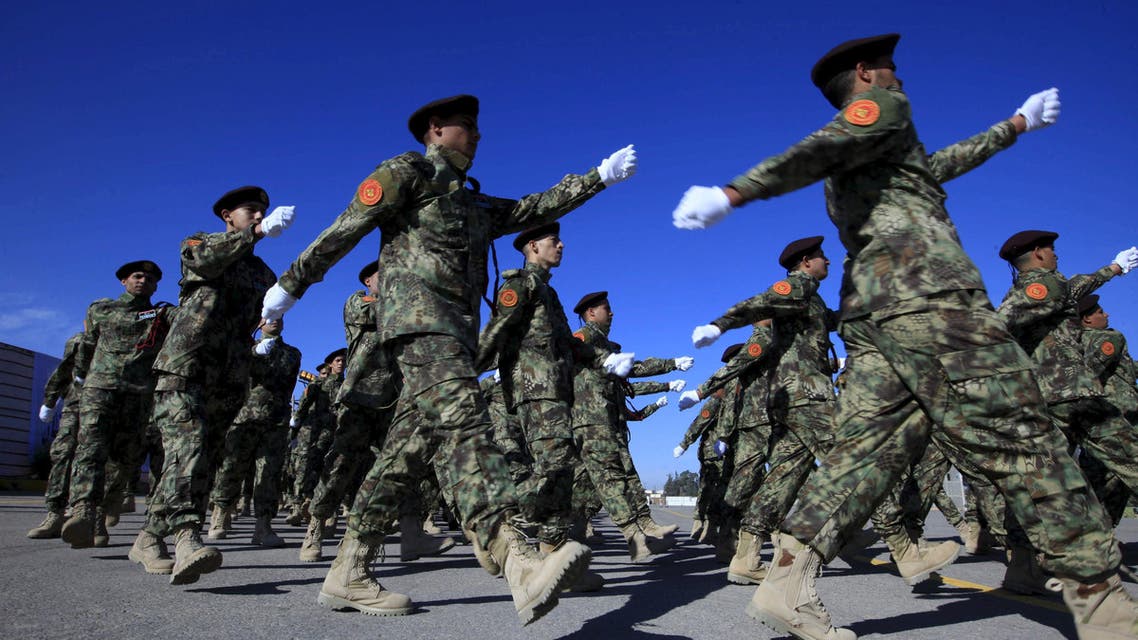 Libyan Army soldiers take part in a military graduation parade in Tripoli December 24, 2015. REUTERS/Ismail Zitouny