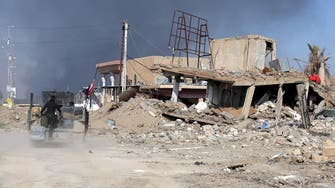 Terrified families emerge from rubble after battle of Ramadi 