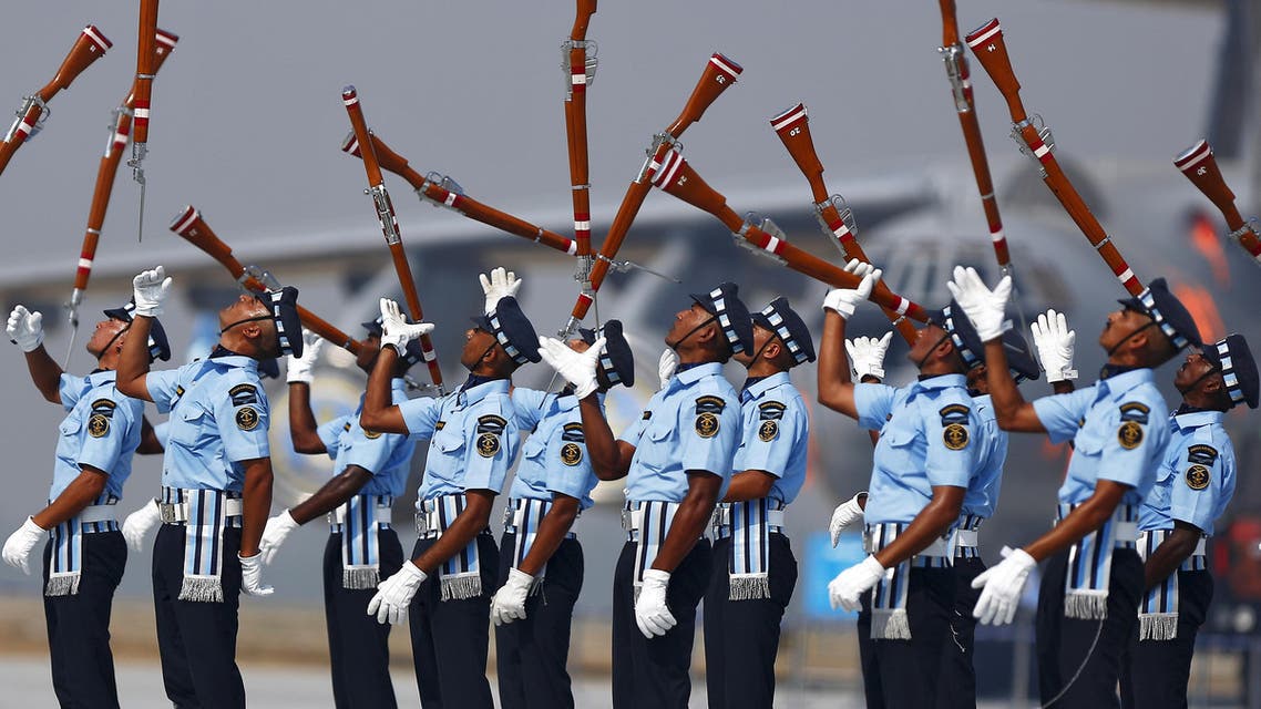 Indian Air Force soldiers toss their rifles as they perform during the full-dress rehearsal for Indian Air Force Day at the Hindon air force station on the outskirts of New Delhi October 6, 2015. (Reuters)
