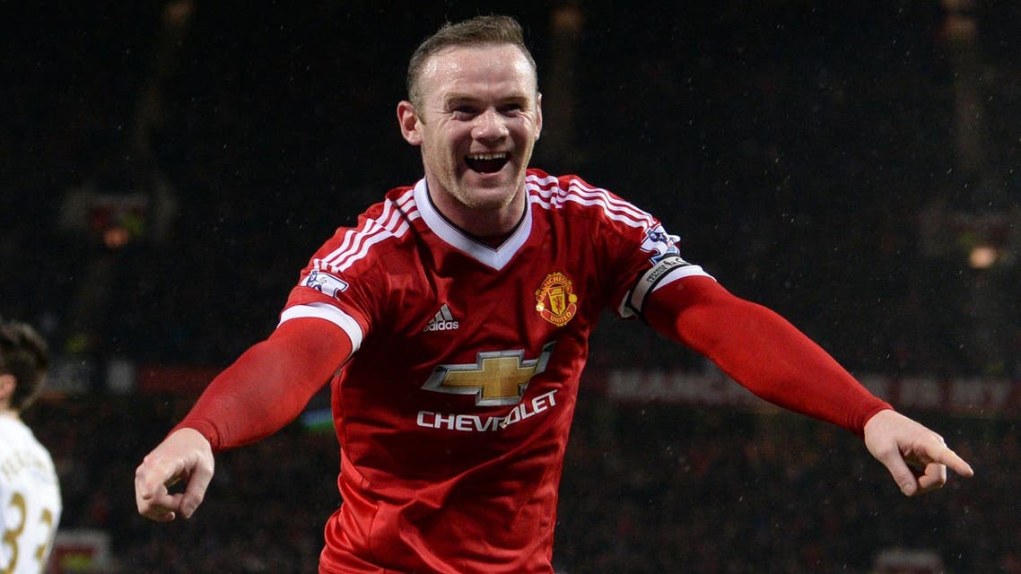 Manchester United's English striker Wayne Rooney celebrates scoring his team's second goal during the English Premier League football match between Manchester United and Swansea City at Old Trafford in Manchester, north west England, on January 2, 2016. AFP