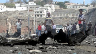People gather at the site of a car bomb attack that killed the governor of Yemen's southern port city of Aden. (File photo: Reuters)