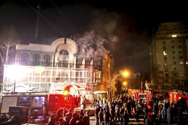 Flames rise from Saudi Arabia’s embassy during a demonstration in Tehran on January 2, 2016. (Reuters)