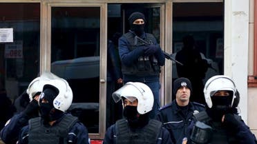 Turkish riot police stand guard outside the pro-Kurdish Democratic Regions Party (DBP) headquarters in the southeastern city of Diyarbakir, Turkey, January 5, 2016 | Reuters