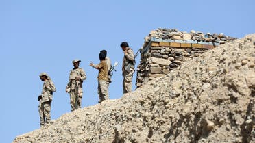 Soldiers loyal to Yemen's President Abd-Rabbu Mansour Hadi stand at their position in Majaz district of Yemen's northwestern provinceo of Marib after the pro-Hadi forces took it from Houthi rebels. (Reuters)