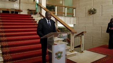 Ivory Coast secretary general of the presidence, Amadou Gon Coulibaly reads a declaration at the presidential palace in Abidjan, January 6, 2016 | Reuters