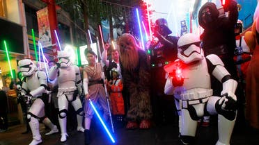 Fans dressed as Star Wars characters parade outside a movie theater showing "Star Wars: The Force Awakens". (File photo: AP)