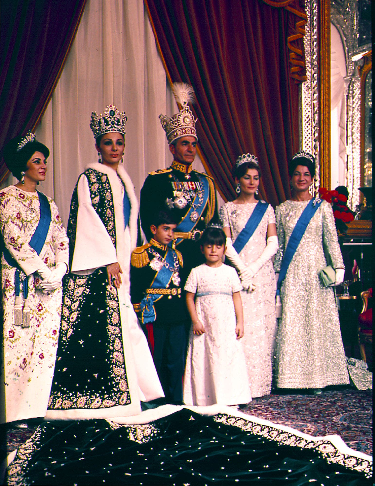 Official photograph of the Shah of Iran Mohammad Reza Pahlavi and his wife Queen Farah with members of the Royal family posing on October 26, 1967 in Tehran, Iran after their coronation ceremony. ap